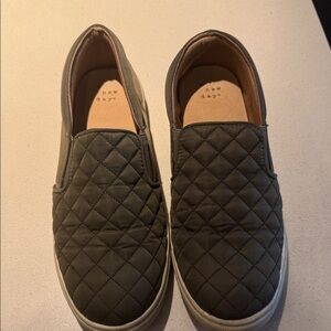 Green quilted slip-ons